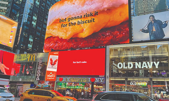 photograph of economist billboard displaying the words 